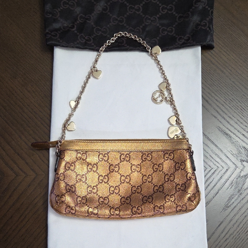 Guccissima Leather Bronze Pochette With Heart Chain And Dust Bag